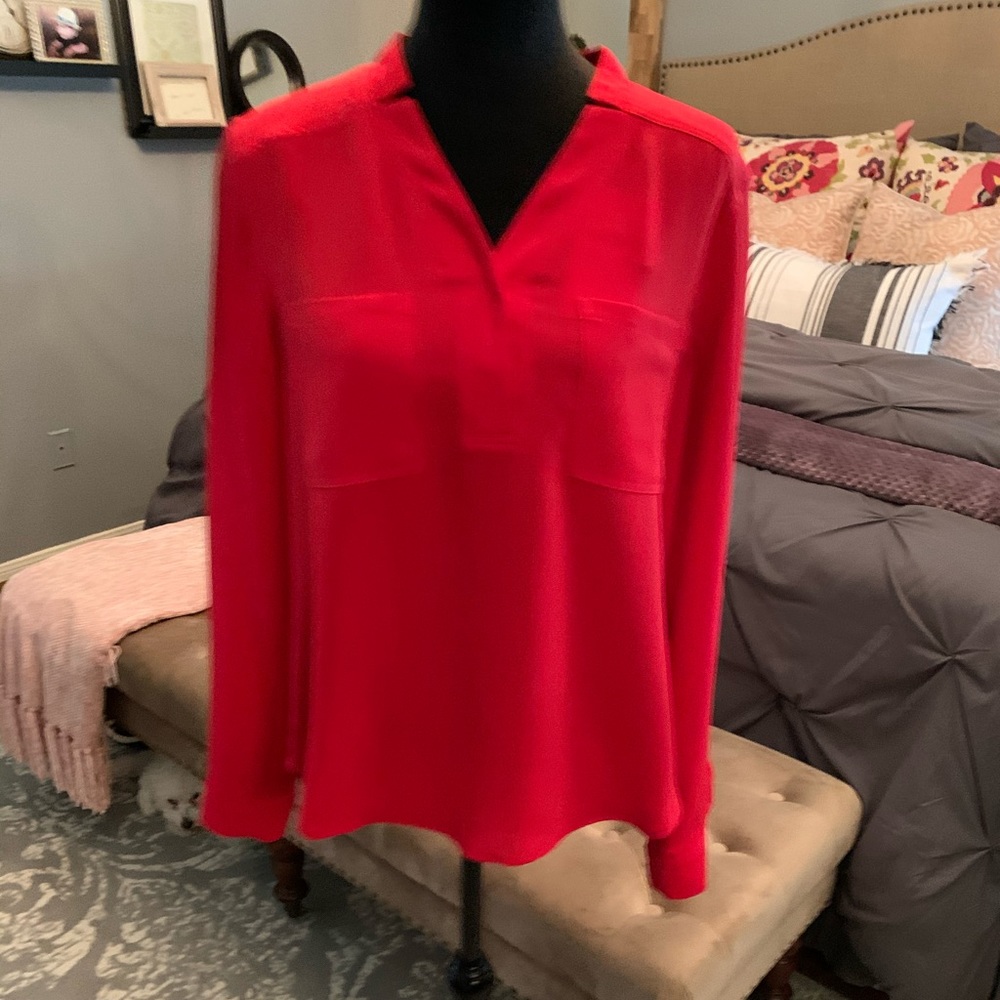 Blouse with pockets over breasts